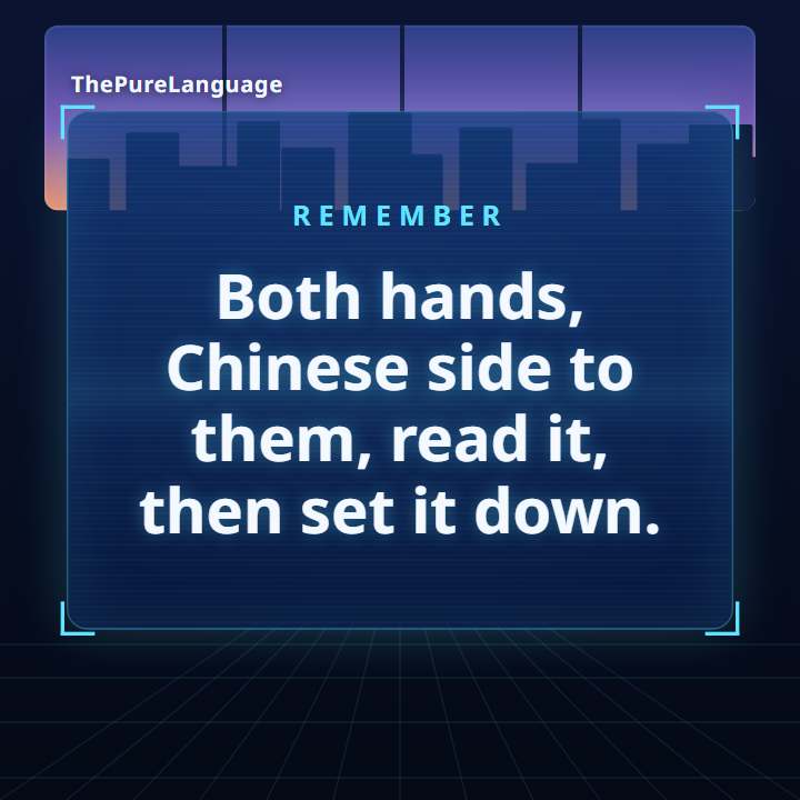 Lesson video: How to exchange business cards in China. Both hands, Chinese side to them, read it, then set it down.